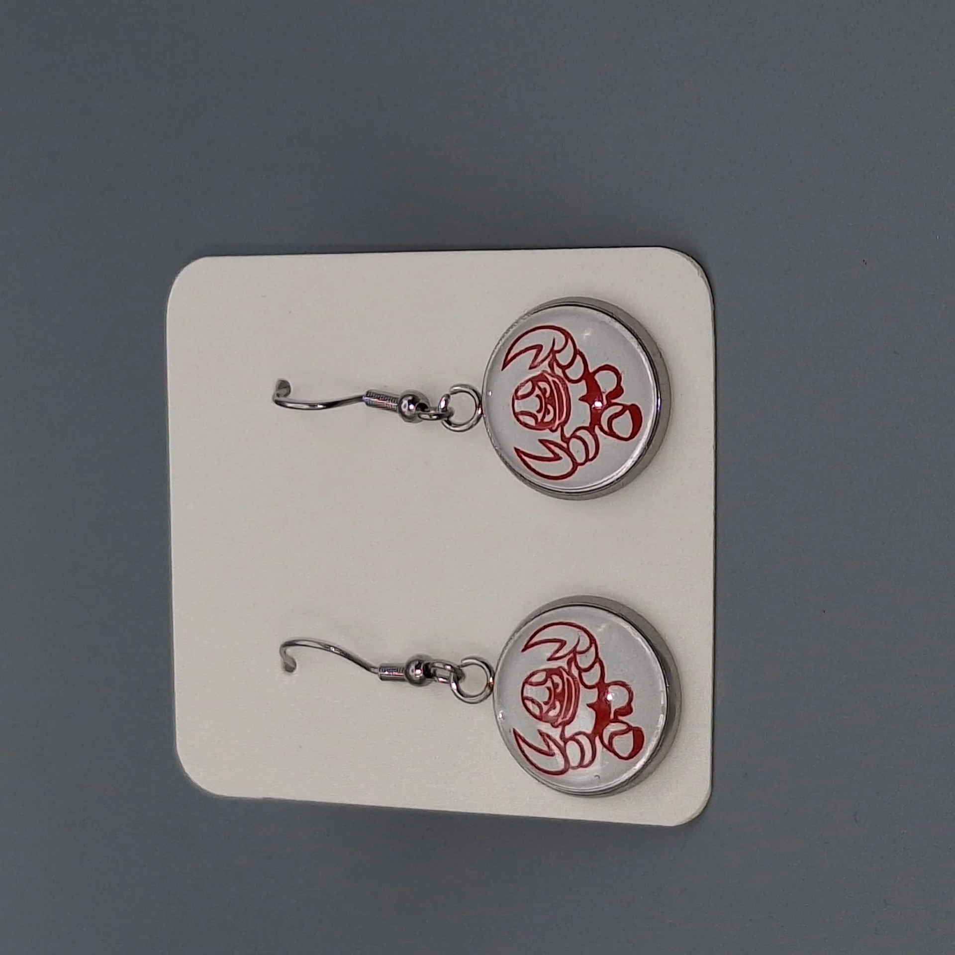 Crayfish Ohranhänger rund – Logo & Glasoptik